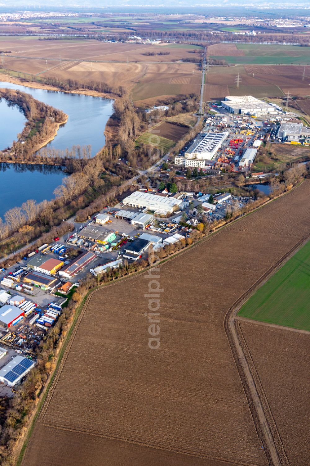 Bobenheim-Roxheim from the bird's eye view: Industrial and commercial area Am Silbersee on street Industriestrasse in Bobenheim-Roxheim in the state Rhineland-Palatinate, Germany