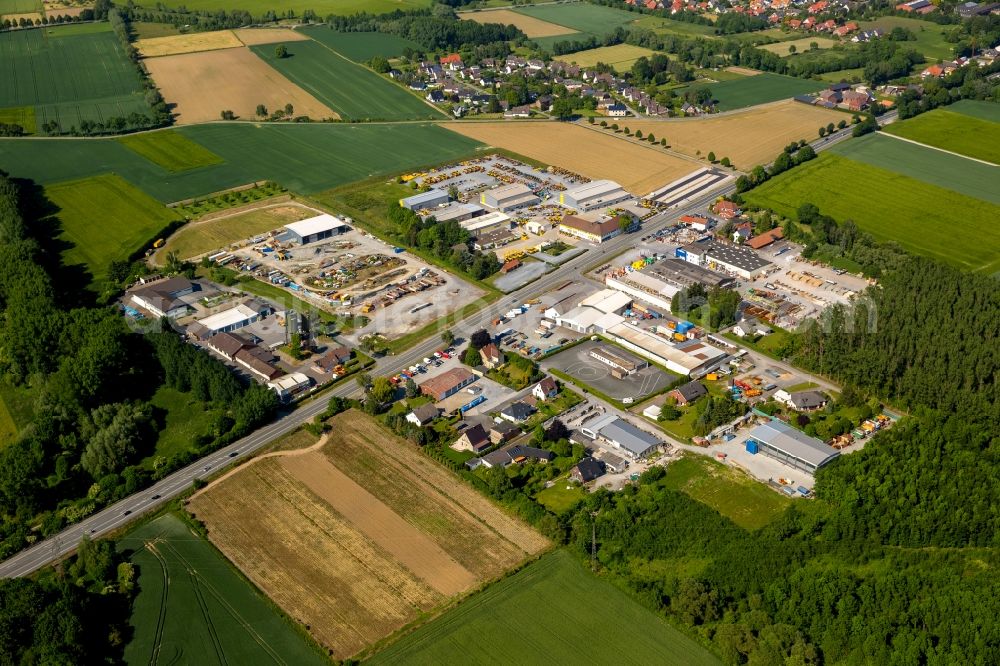 Aerial photograph Erwitte - Industrial and commercial area along the course of the road Soester Strasse - B55 in Erwitte in the state North Rhine-Westphalia