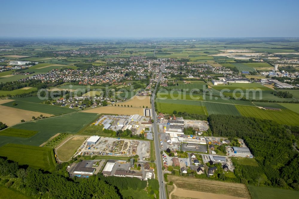 Erwitte from the bird's eye view: Industrial and commercial area along the course of the road Soester Strasse - B55 in Erwitte in the state North Rhine-Westphalia