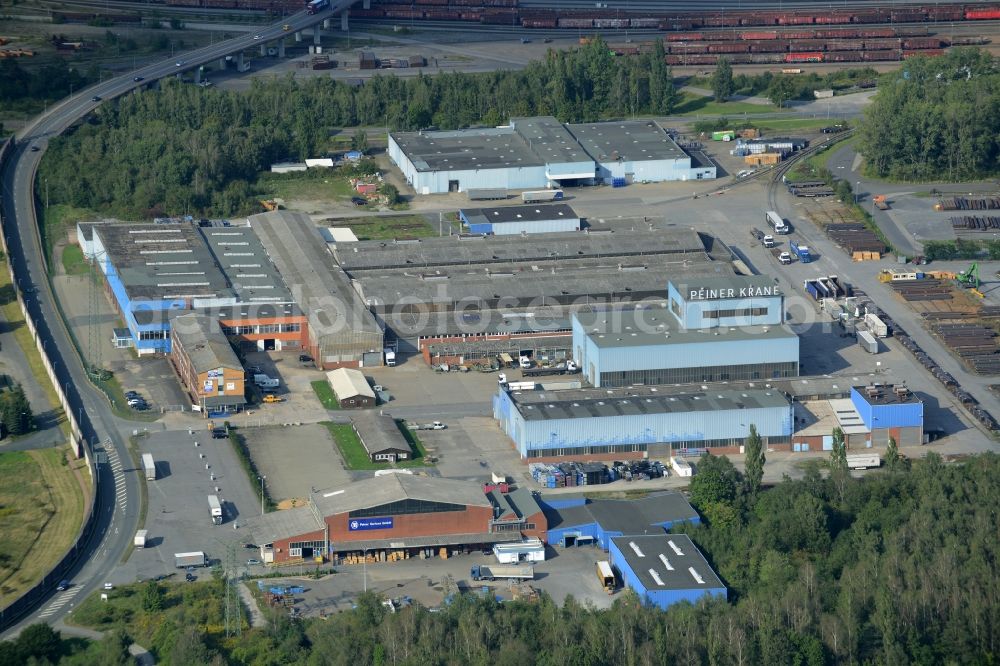 Aerial photograph Peine - Industrial and commercial area Am Stahldorf in Peine in the state of Lower Saxony. Several companies have their buildings and production sites here - mostly of the steel industry