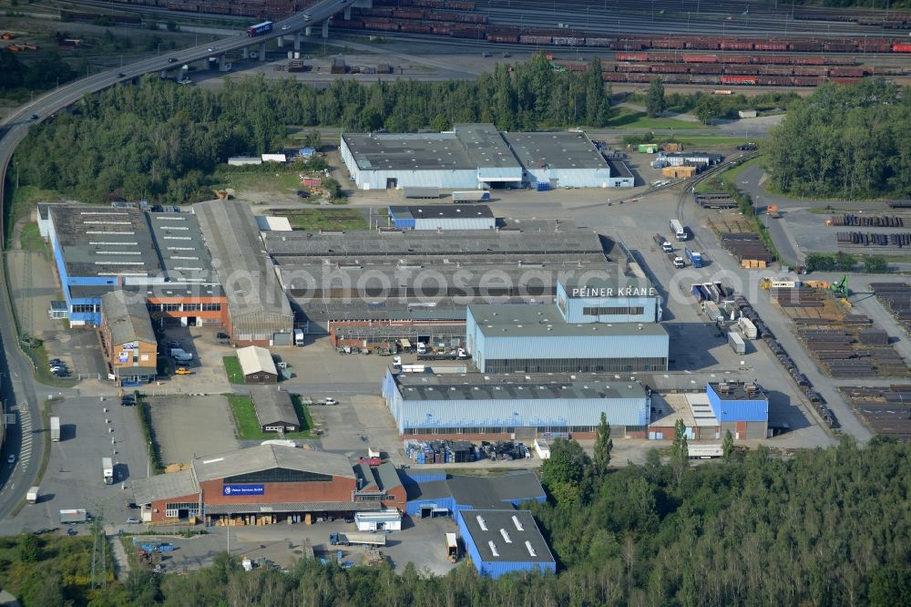 Peine from above - Industrial and commercial area Am Stahldorf in Peine in the state of Lower Saxony. Several companies have their buildings and production sites here - mostly of the steel industry