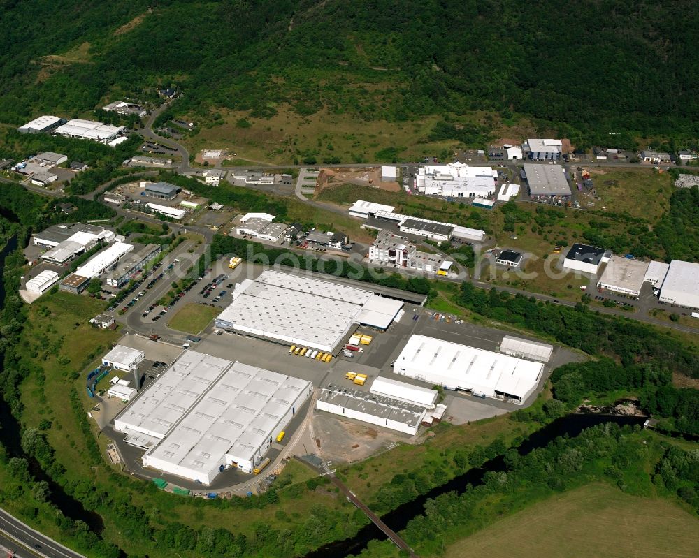 Georg-Weierbach from the bird's eye view: Industrial and commercial area at the edge of the forest in Georg-Weierbach in the state Rhineland-Palatinate, Germany