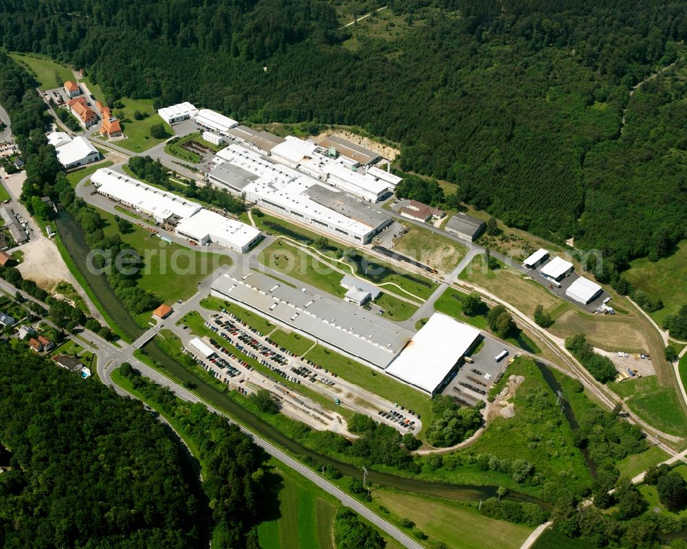 Aerial photograph Laucherthal - Industrial and commercial area at the edge of the forest in Laucherthal in the state Baden-Wuerttemberg, Germany