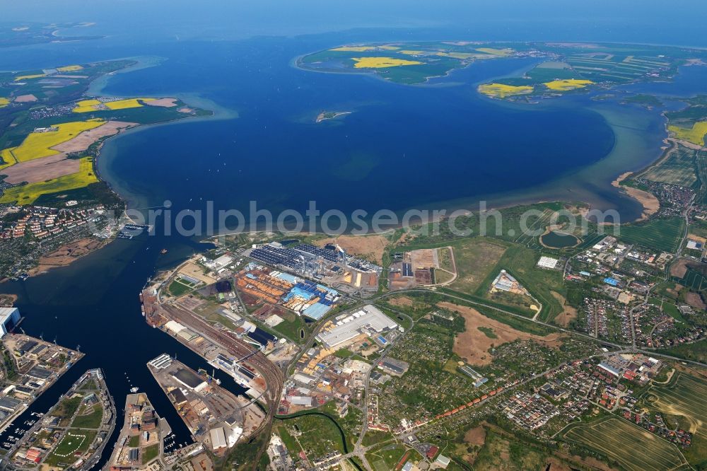 Wismar from the bird's eye view: Industrial and commercial area of the company Egger Holzwerkstoffe Wismar GmbH & Co. KG in Wismar in the state Mecklenburg - Western Pomerania