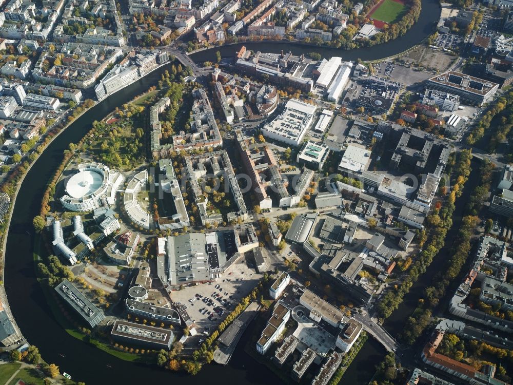 Berlin from the bird's eye view: Industrial and commercial areas along the Spree bow on the river bank with the building of the Fraunhofer Institute in the Charlottenburg district in Berlin