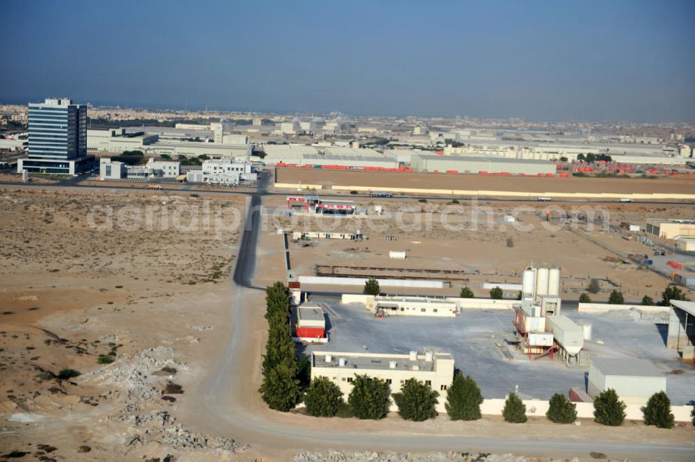 Ras Al Khaimah from above - Industrial and commercial area around the Free Trade Zone Ras Al Khaimah near Al Hamra Village. The Free Trade Zone Ras Al Khaimah, or RAK FTZ, is one of the fastest growing free trade zones in the United Arab Emirates. The RAK FTZ has five facilites