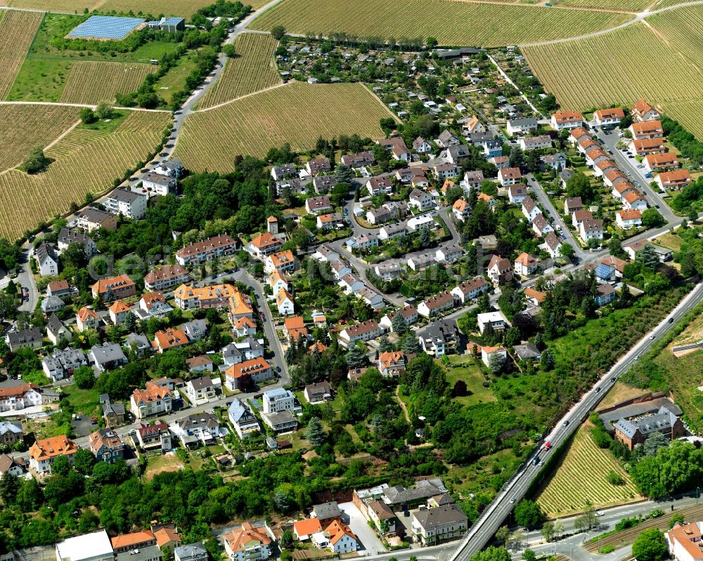 Aerial image Bad Kreuznach - Agriculture, industry and residential areas in the North of Bad Kreuznach in the state of Rhineland-Palatinate. Bad Kreuznach is a spa town and county capital and is located on the rivers Nahe and Ellerbach. Apart from historic buildings and parts of the town, there are also several residential areas with multi-family homes and estates. The North of the town is characterised by industry and agricultural land