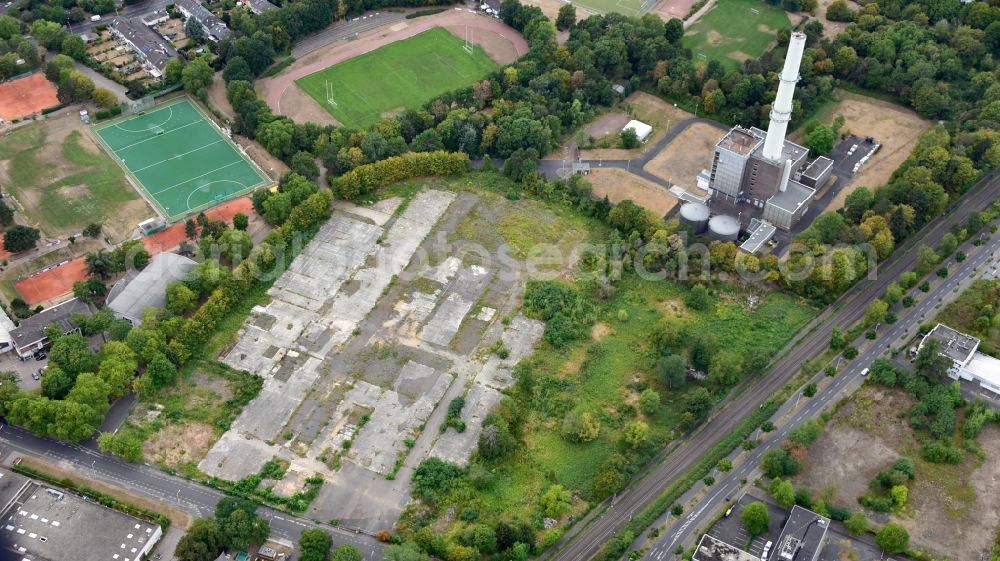 Bonn from the bird's eye view: Industrial wasteland in Bonn Dottendorf in the state North Rhine-Westphalia, Germany. Residential and commercial buildings are to be built on the so-called Miesen site. The development of the site is currently being managed by the city of Bonn.So-called Miesen site