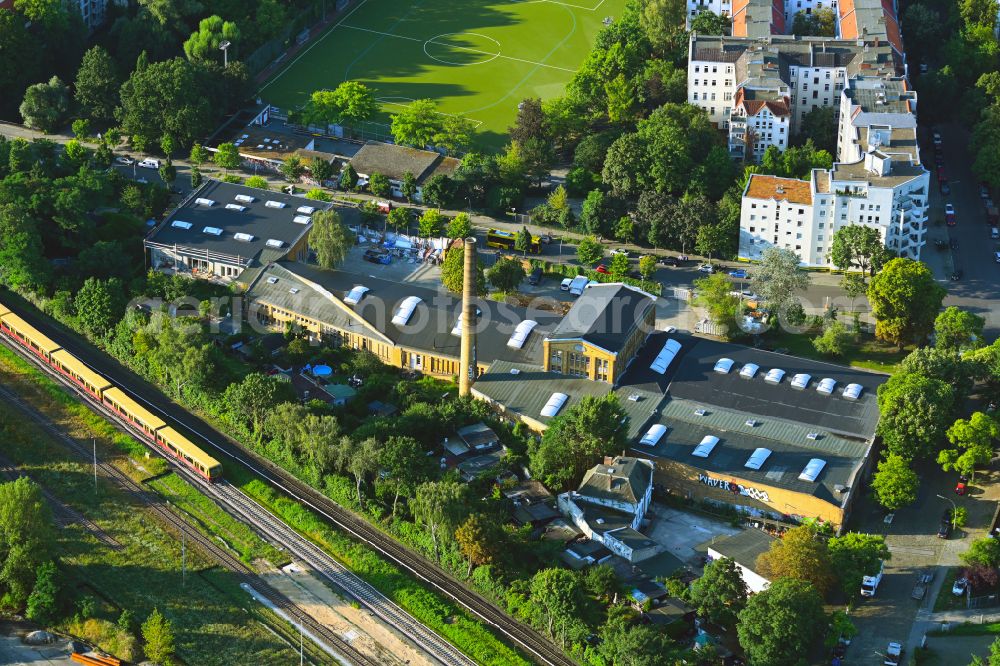 Berlin from the bird's eye view: Factory premises and technical systems and infrastructure in the disused industrial monument Adria Konserven- and Doerrgemuesefabrik Julius Feher AG on street Kuehnemannstrasse in the district Reinickendorf in Berlin, Germany