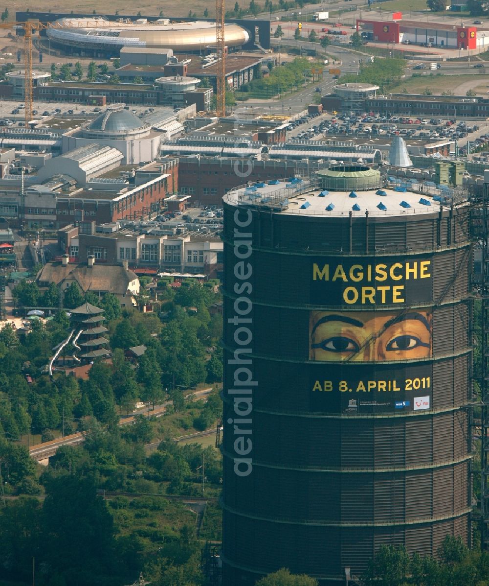 Oberhausen from the bird's eye view: Gas tank serves as an industrial monument Gasometer Oberhausen Gmbh and an exhibition at the Arenastrasse in Oberhausen in North Rhine-Westphalia