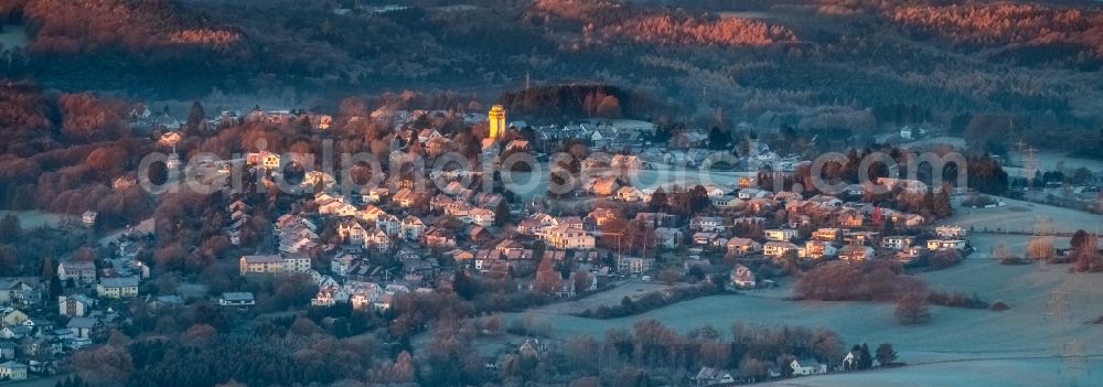 Witten from above - Building of industrial monument water tower - yellow shining in the sunrise in the district Bommern in Witten in the state North Rhine-Westphalia