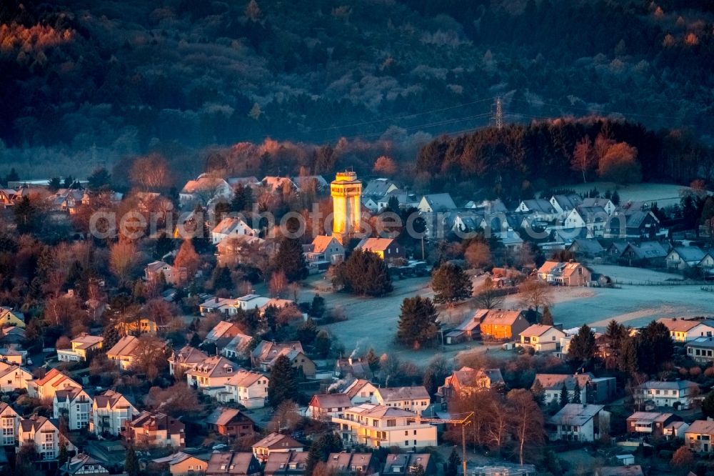 Aerial image Witten - Building of industrial monument water tower - yellow shining in the sunrise in the district Bommern in Witten in the state North Rhine-Westphalia