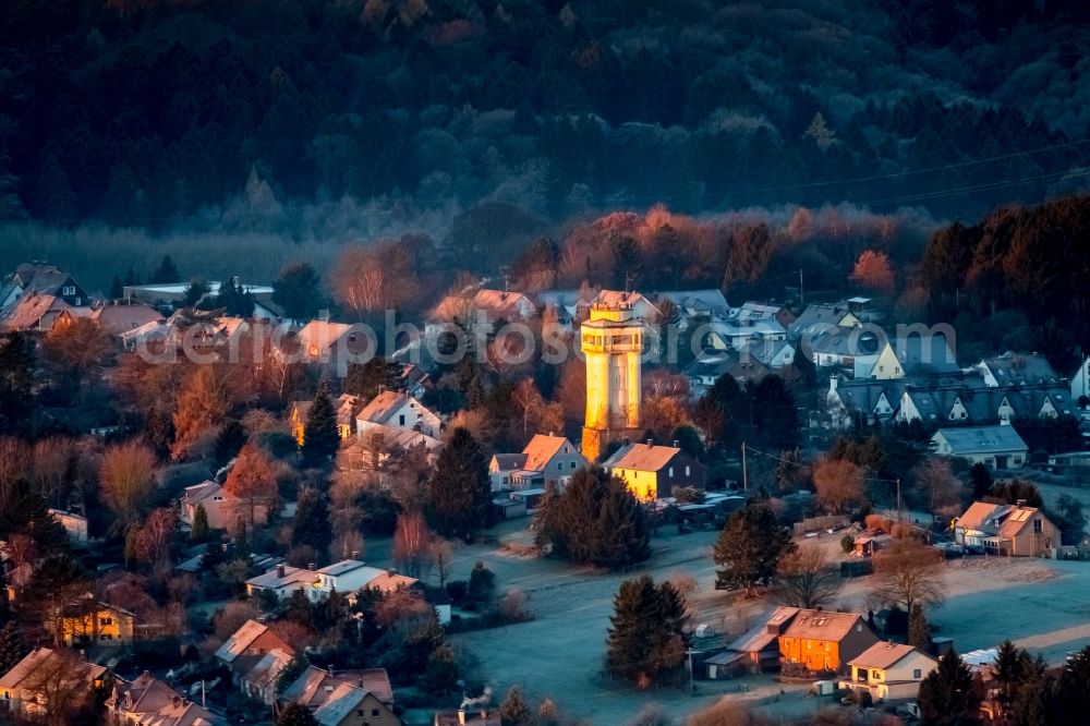 Witten from above - Building of industrial monument water tower - yellow shining in the sunrise in the district Bommern in Witten in the state North Rhine-Westphalia