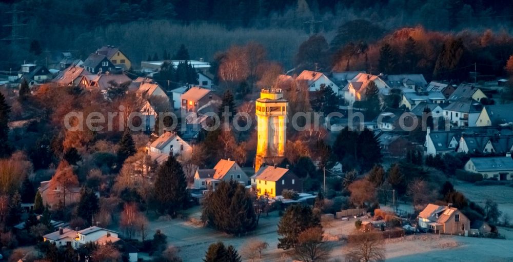 Aerial image Witten - Building of industrial monument water tower - yellow shining in the sunrise in the district Bommern in Witten in the state North Rhine-Westphalia