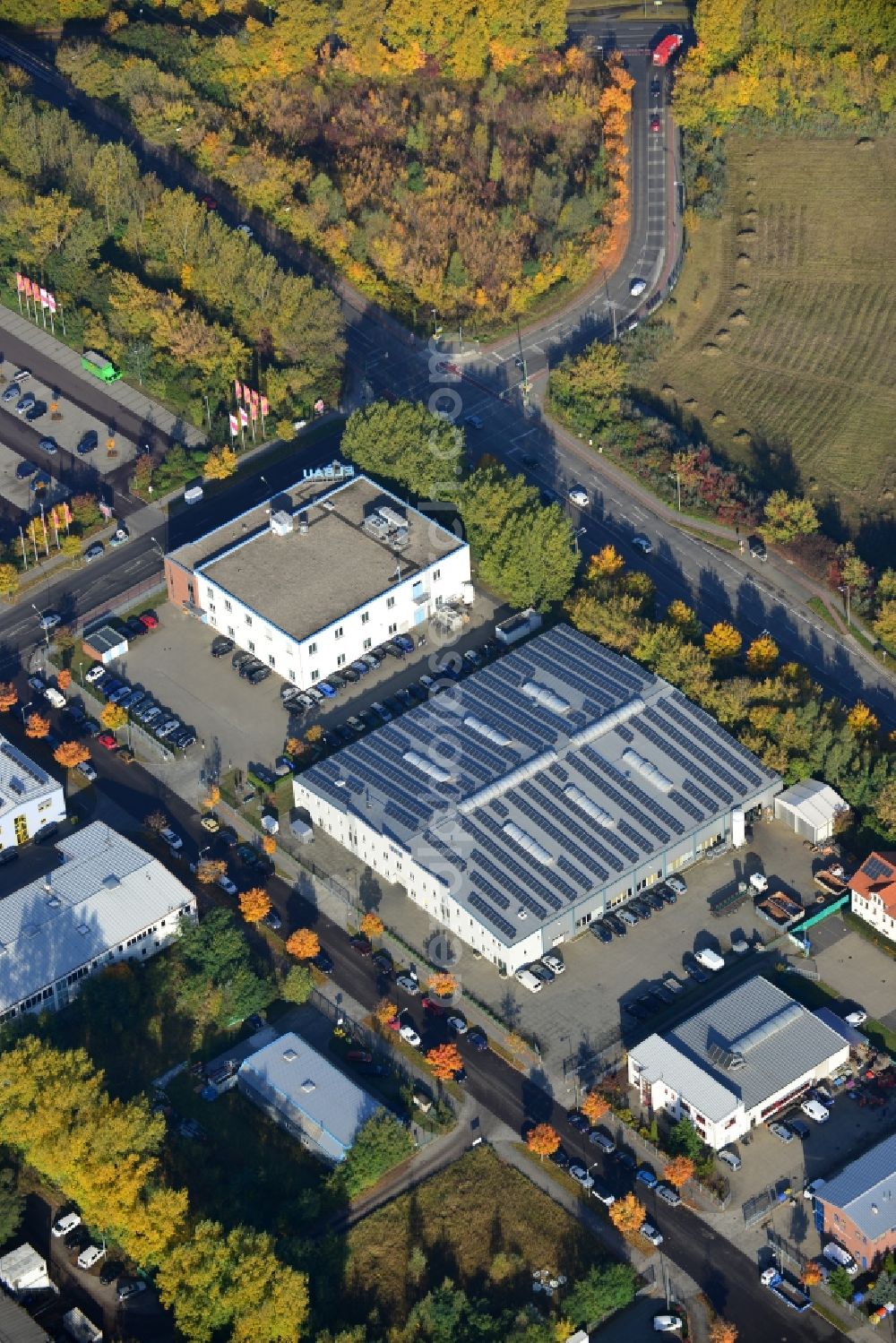 Aerial photograph Berlin - View of the industrial area of Darßer bow in Berlin Weissensee. In the picture, the building of the service center BZW