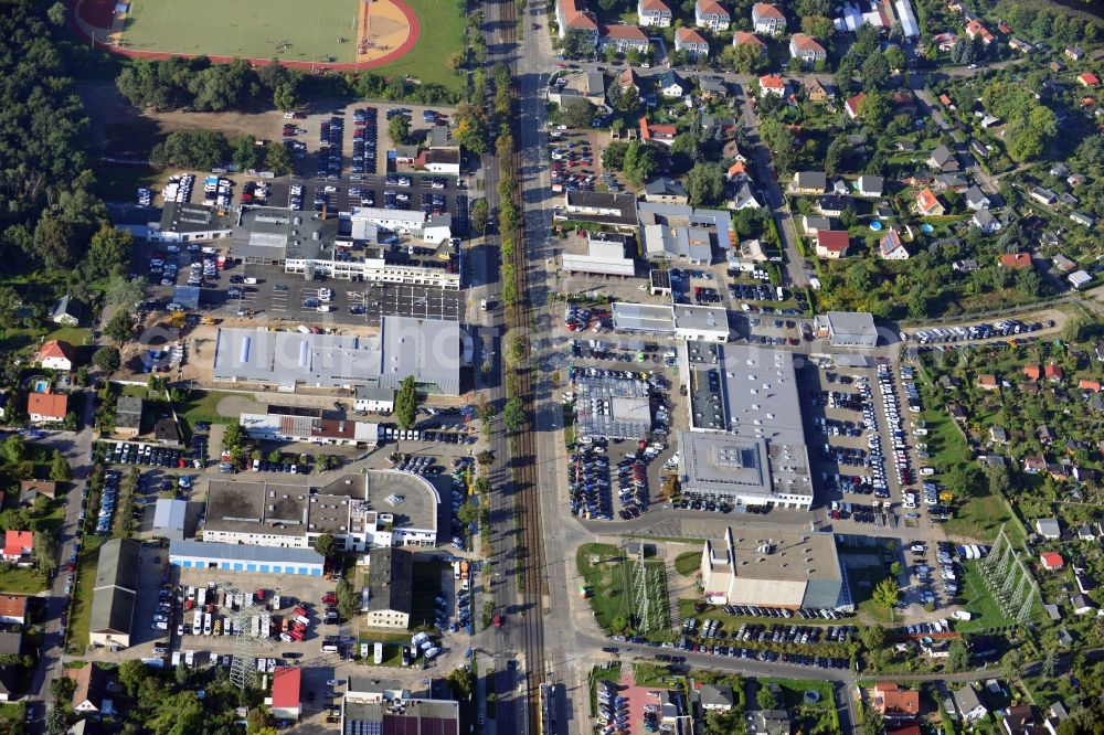 Aerial photograph Berlin - View at the möbus - group area Hansastraße in the district Weissensee in Berlin. Here are among others several car dealers, workshops and an inspection workshop of the DEKRA located