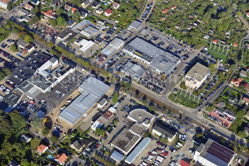 Aerial photograph Berlin - View at the möbus - group area Hansastraße in the district Weissensee in Berlin. Here are among others several car dealers, workshops and an inspection workshop of the DEKRA located