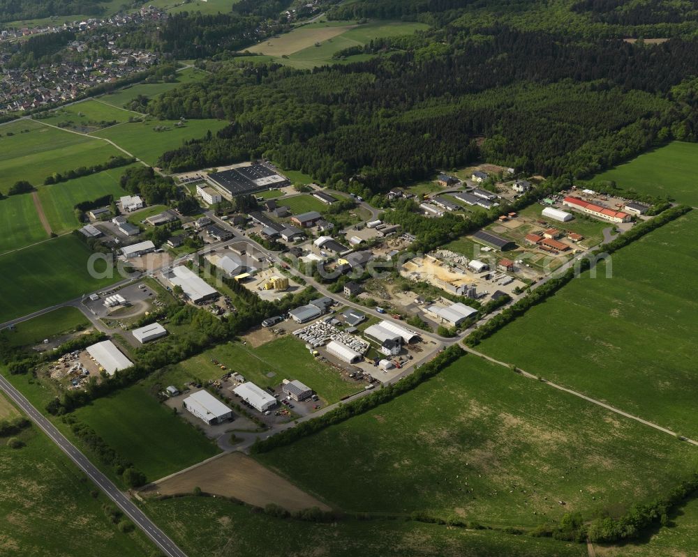 Kempenich from the bird's eye view: View of the industrial area in Kempenich in Rhineland-Palatinate. Among others the Wolfcraft GmbH and the Reifen Radermacher GmbH are located here