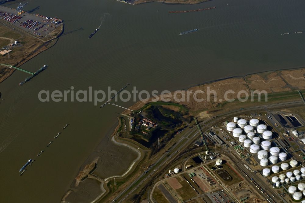 Aerial photograph Antwerpen - Industrial areas, logistics centers and fuel storage on the banks of the Scheldt flux flow with the two ancient fortifications Fort Liefenshoekin and Lillo-Fort in Antwerp, Belgium