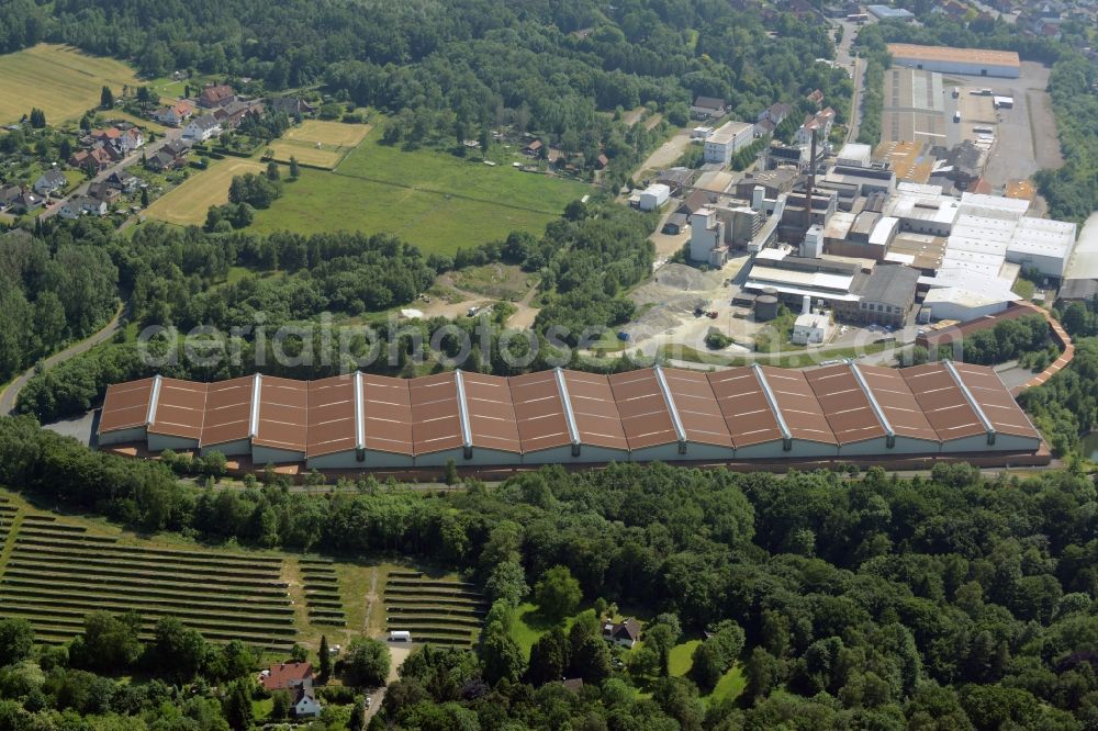 Obernkirchen from the bird's eye view: Industrial compound and production site of Ardagh Glass in Obernkirchen in the state of Lower Saxony. The large site with different buildings, halls and the large distinct hall with red-brown roof is the site of two Ardagh Glass companies that produce for the international glass industry: Heye International and Schaumburger Formenbau GmbH