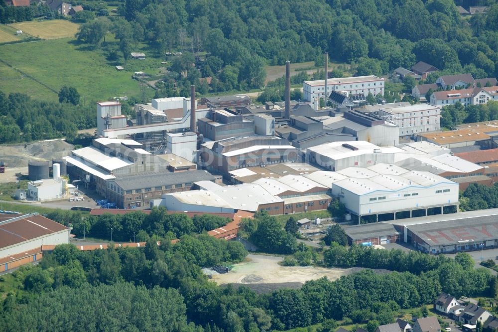 Obernkirchen from the bird's eye view: Industrial compound and production site of Ardagh Glass in Obernkirchen in the state of Lower Saxony. The large site with different buildings, halls and the large distinct hall with red-brown roof is the site of two Ardagh Glass companies that produce for the international glass industry: Heye International and Schaumburger Formenbau GmbH