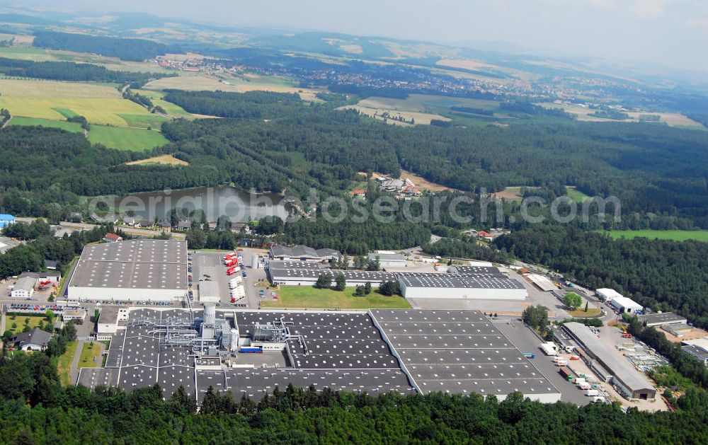 Aerial image Waldmohr - Blick auf das Industriegelände am Motschweiher in Waldmohr. Waldmohr lebt heute überwiegend von Industrie- und Handwerksbetrieben. Es ist der größte Industriestandort im Landkreis Kusel. Größter Arbeitgeber mit 590 Beschäftigten ist die Firma Schmal Möbel GmbH. In den letzten Jahren ist die Firma Minitec stark gewachsen, sie hat derzeit ca. 190 Mitarbeiter. Die Firma verfügt über ein Patent für Aluminiumprofile, bei denen keine Bohrungen mehr notwendig sind. Kontakt: CS Schmalmöbel GmbH & Co. KG, Industriestr. 27, 66914 Waldmohr, Tel.: 06373-821-0,