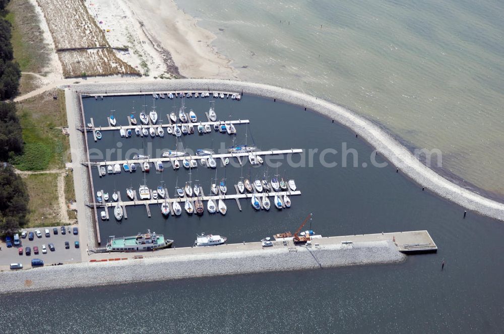 Aerial image Lubmin - Blick auf den Industriehafen Lubmin nahe dem stillgelegtem Kernkraftwerk / KKW VEB Brunno Leuschner, nach der Wende Kernkraftwerk Greifswald / KGR. Zur Industrieansiedlung wurde der ehemalige Kühlwasserauslaufkanal des KKW mit öffentlichen Mitteln zu einem Hafen ausgebaut. Zusätzlich soll ein Gasturbinenkraftwerk errichtet werden, das den Standort attraktiv für energieintensive Industrie (Holz, Papier, Metall) machen soll. Heute erfolgt der Rückbau des KKW durch die Energiewerke Nord GmbH, Latzower Staße 1, 17509 Rubenow, Tel. +49(0)38354 40, Fax: +49(0)38354 22458, e-mal: poststelle@ewn-gmbh.de