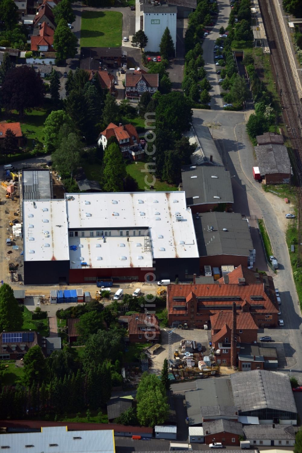 Bad Bevensen from above - Construction site at the streets Eppenser Weg and Gueterstrasse for the construction of a newly build industrial building in Bad Bevensen in the state Niedersachsen. The industrial area is in the vicinity of the local train station