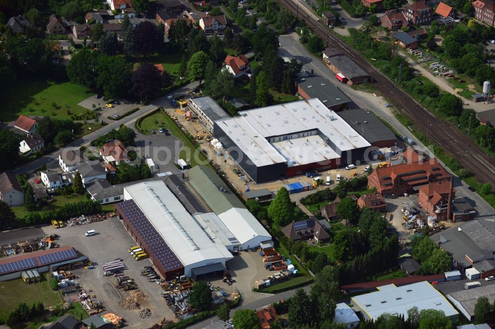 Aerial image Bad Bevensen - Construction site at the streets Eppenser Weg and Gueterstrasse for the construction of a newly build industrial building in Bad Bevensen in the state Niedersachsen. Located next to it is the Karl Popp GmbH & Co. KG. The industrial area is in the vicinity of the local train station