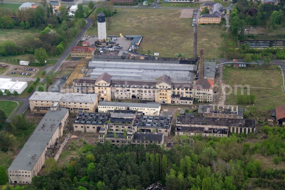 Premnitz from the bird's eye view: Ruins of a factory in the industrial park in Premnitz in the state Brandenburg