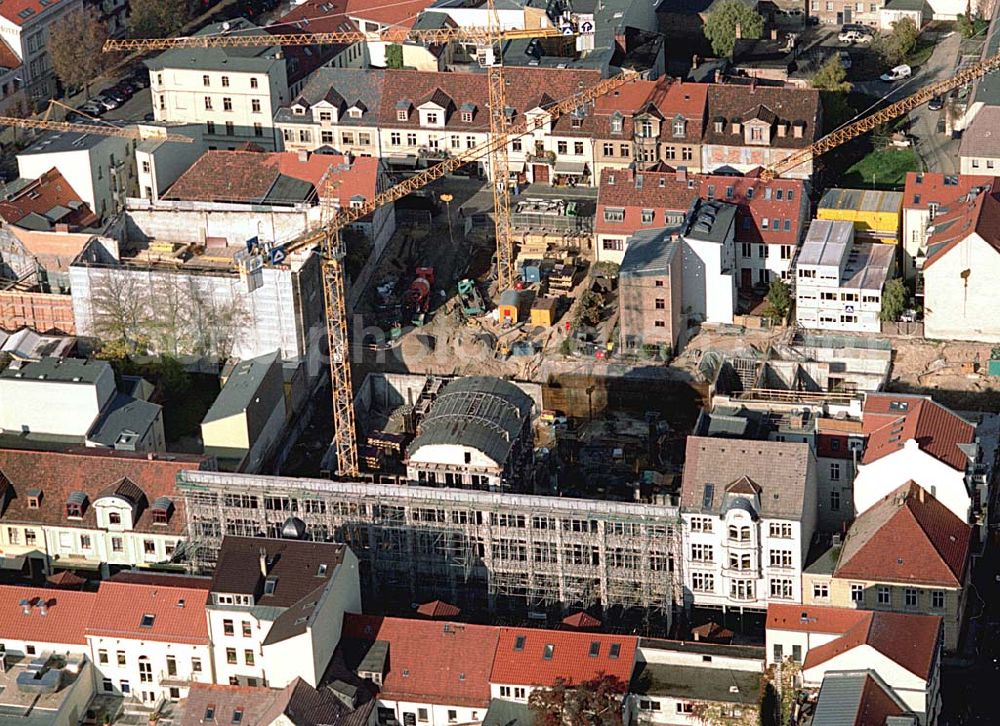 Potsdam from above - Neubau Karstadt Kaufhaus Potsdam an der Brandenburger Straße. Karstadt Immobilien AG (Pressesprecher: Erich Jeske 0911 / 14 - 23459 oder - 22224, 0911 / 14-24330,erich.jeske@quelle.de), Projektsteuerung: Josef Esch Vermögensverwaltungs GmbH (022419870, info@jefp.biz, Fr Stassen), Firma Ernst Jung (0302547121350, carola.voelkner@de.gy.com, Fr. Völkner), Hochtief Erfurt (0331743440, katrin.toepfer@hochtief.de, Fr. Toepfer), Fassade:Firma Roland Schulze (0331296816, info@baudenkmalpflege.de, Fr. Schulze).