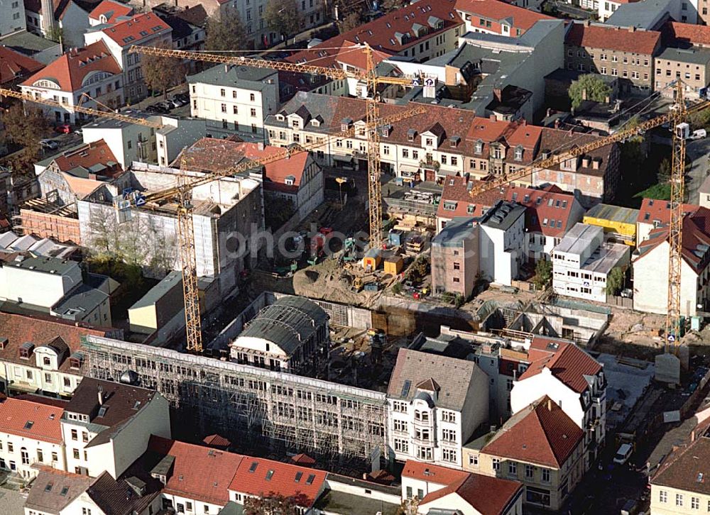 Potsdam from the bird's eye view: Neubau Karstadt Kaufhaus Potsdam an der Brandenburger Straße. Karstadt Immobilien AG (Pressesprecher: Erich Jeske 0911 / 14 - 23459 oder - 22224, 0911 / 14-24330,erich.jeske@quelle.de), Projektsteuerung: Josef Esch Vermögensverwaltungs GmbH (022419870, info@jefp.biz, Fr Stassen), Firma Ernst Jung (0302547121350, carola.voelkner@de.gy.com, Fr. Völkner), Hochtief Erfurt (0331743440, katrin.toepfer@hochtief.de, Fr. Toepfer), Fassade:Firma Roland Schulze (0331296816, info@baudenkmalpflege.de, Fr. Schulze).