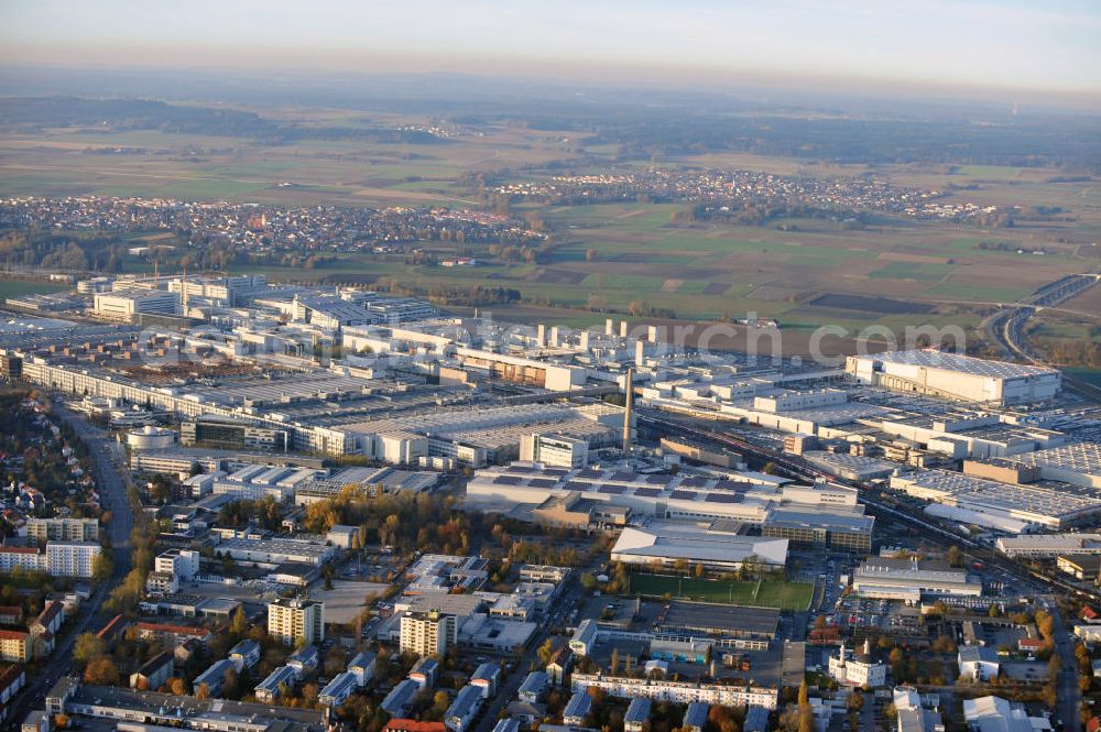 Ingolstadt from the bird's eye view: Blick über die Werkshallen der Audi AG auf den Ingolstädter Ortsteil Etting bis nach Wettstetten. View across the plant halls of the car producing Audi AG up to Ingolstadt ditrict Etting and the town Wettstetten.