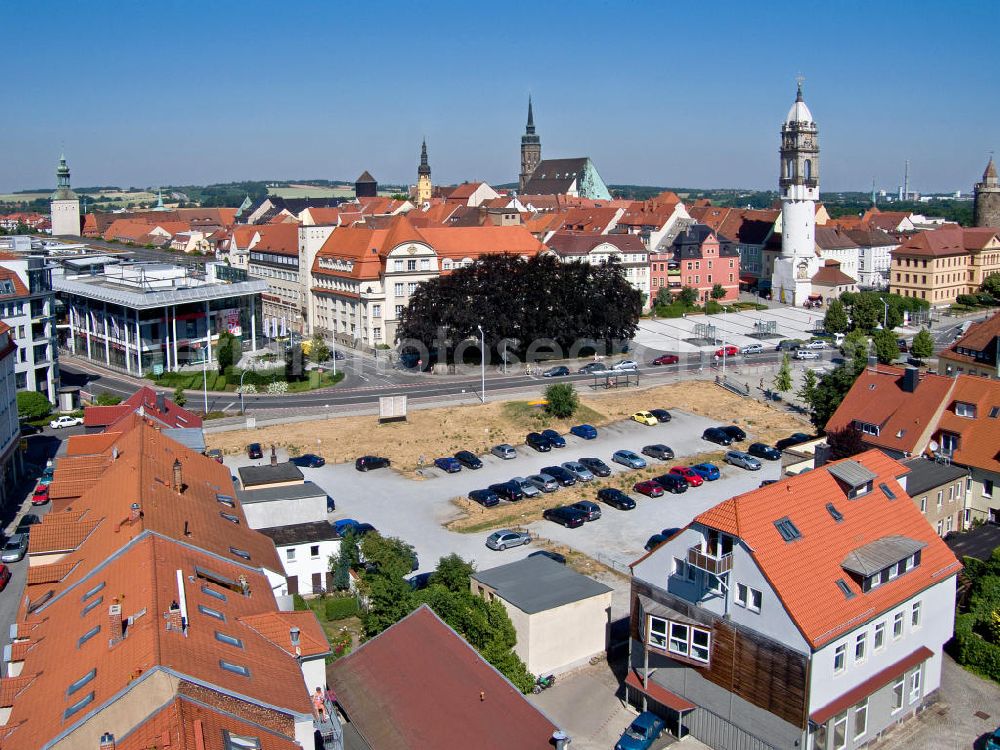 Bautzen from above - Blick über die Dächer der Innenstadt von Bautzen. Altststadtteile mit Reichenturm, Dom und Rathaus im Kontrast zum Neubau des Einkaufszentrums Kornmarktcenter. View over the rooftops of Bautzen. Part of th old town with rich tower, cathedral and town hall in contrast to the construction of the new shopping center.