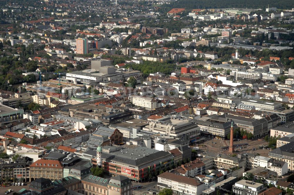 Aerial photograph Darmstadt - Blick auf die Innenstadt von Darmstadt mit dem Ludwigsmonument. Das Ludwigsmonument ist ein Denkmal für Ludwig I., den ersten Großherzog von Hessen und ein Wahrzeichen der Stadt Darmstadt. Es steht auf dem Luisenplatz in Darmstadt, benannt nach der Ehefrau des Großherzogs. Von den Einwohnern wird das Bauwerk meist Langer Ludwig oder Longe Lui genannt. Die Grundsteinlegung des Monumentes war am 14. Juni 1841, dem Geburtstag von Ludwig I., 11 Jahre nach seinem Tod. Am 25. August 1844 wurde das Bauwerk feierlich eingeweiht. Die Säule wurde entworfen von Georg Moller, die Statue von Ludwig Schwanthaler und gegossen von Johann Baptist Stiglmaier.