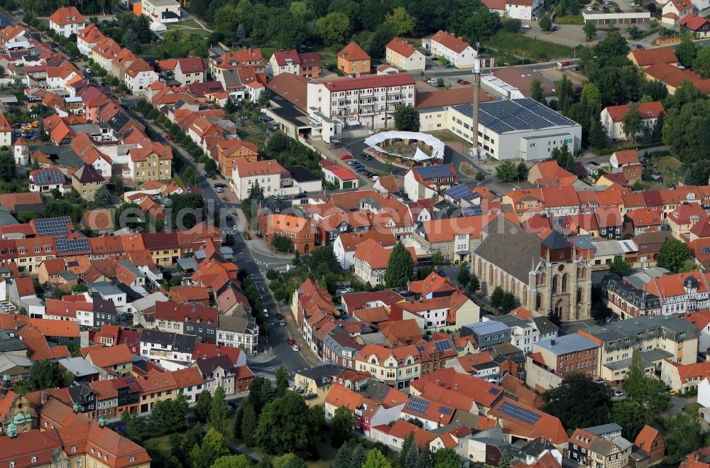 Aerial photograph Dingelstädt - Downtown from Dingelstaedt with the church Sankt Gertrudiskirche, the bus station and the MB Modeproduktion and Vertriebs GmbH in Thuringia