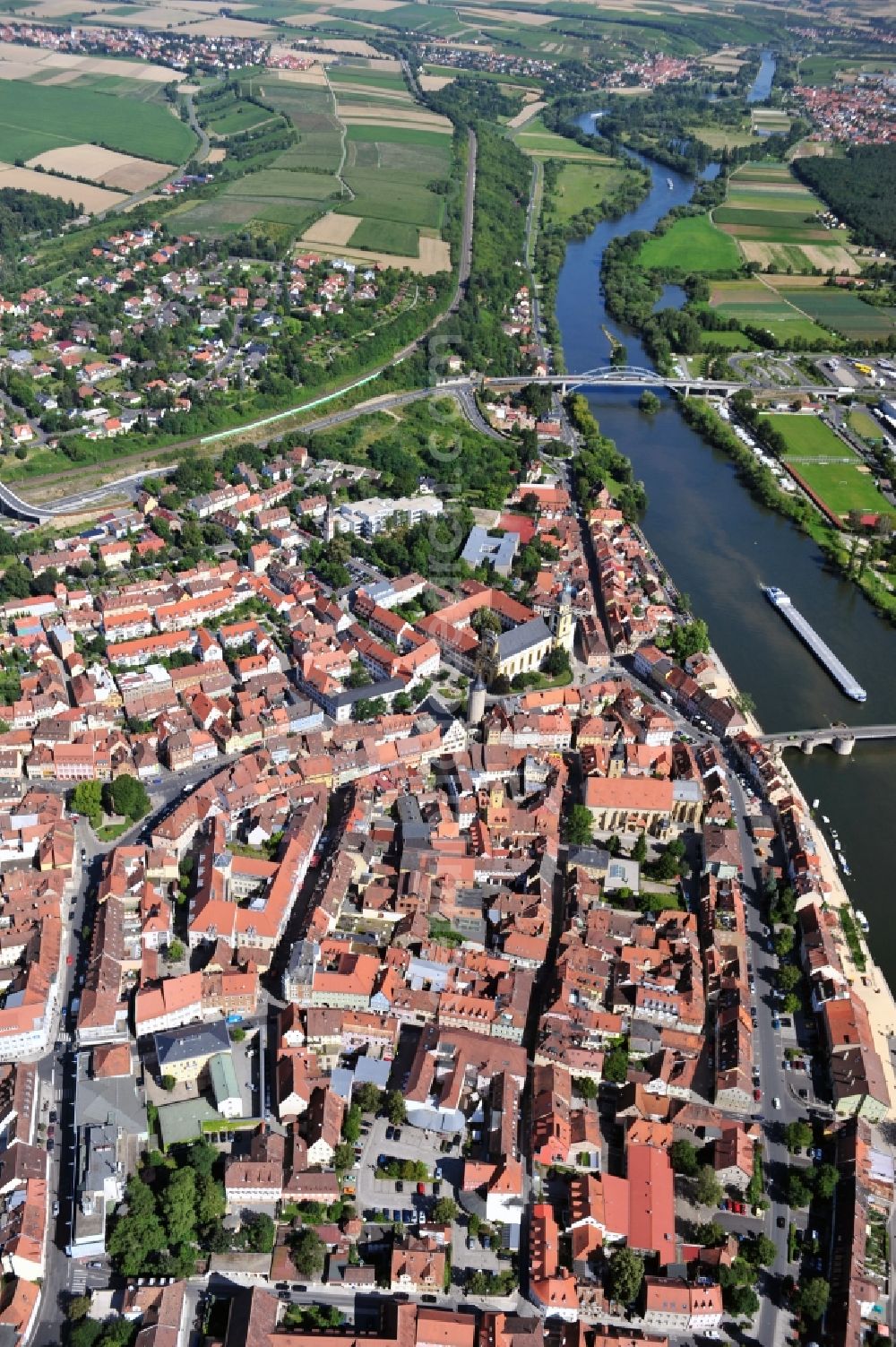 Kitzingen am Main from above - View at the Main Bridge and the city center with the Ursuline Convent and the City Council of Kitzingen am Main in Bavaria. As one of the oldest cities of Lower Franconia Kitzingen was mentioned 745 for the first time