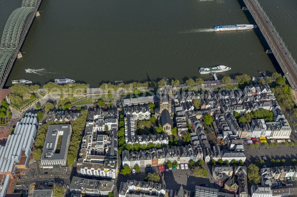 Aerial photograph Köln - View of a residential area in the city center of Cologne, with view of the church Gross St. Martin, the museum Ludwig and the river Rhine in the state North Rhine-Westphalia.The church Gross St. Martin is a seat of the community of Jerusalem. The Deutz bridge and the bridhe Hohenzollernbruecke lead in this place over the Rhine