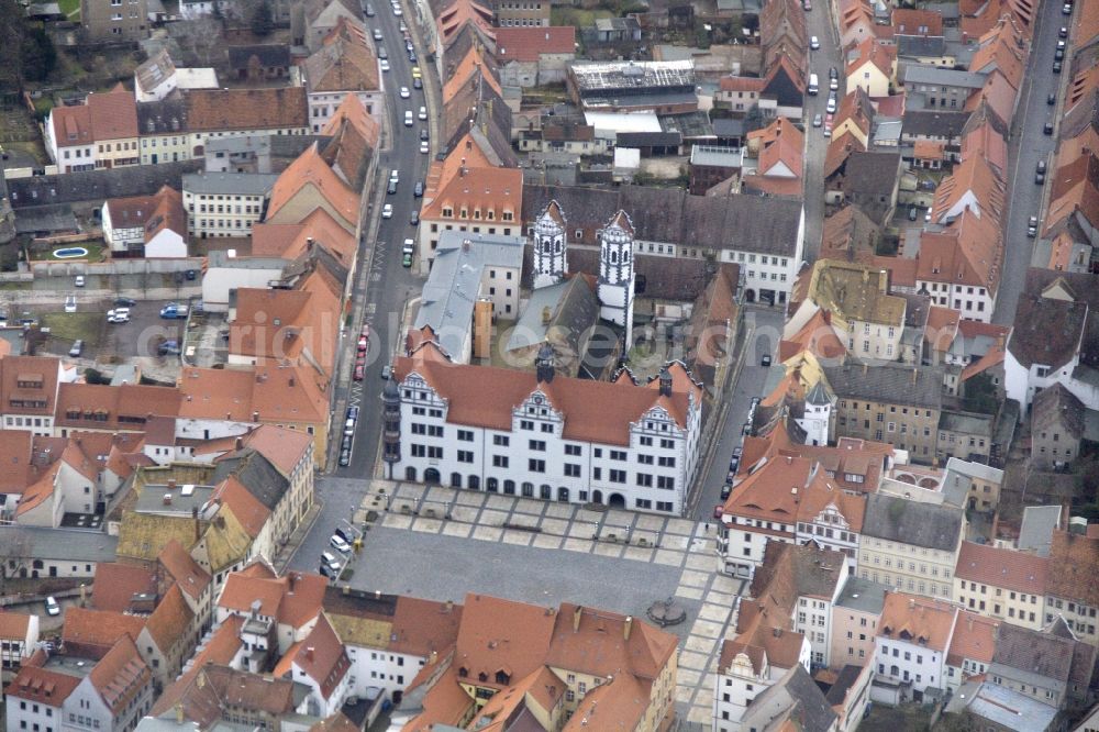 Torgau from the bird's eye view: Downtown with the market place and the desecrated St. Nicholas Church Torgau in Saxony. The church is located in the back of the Town Hall Torgau