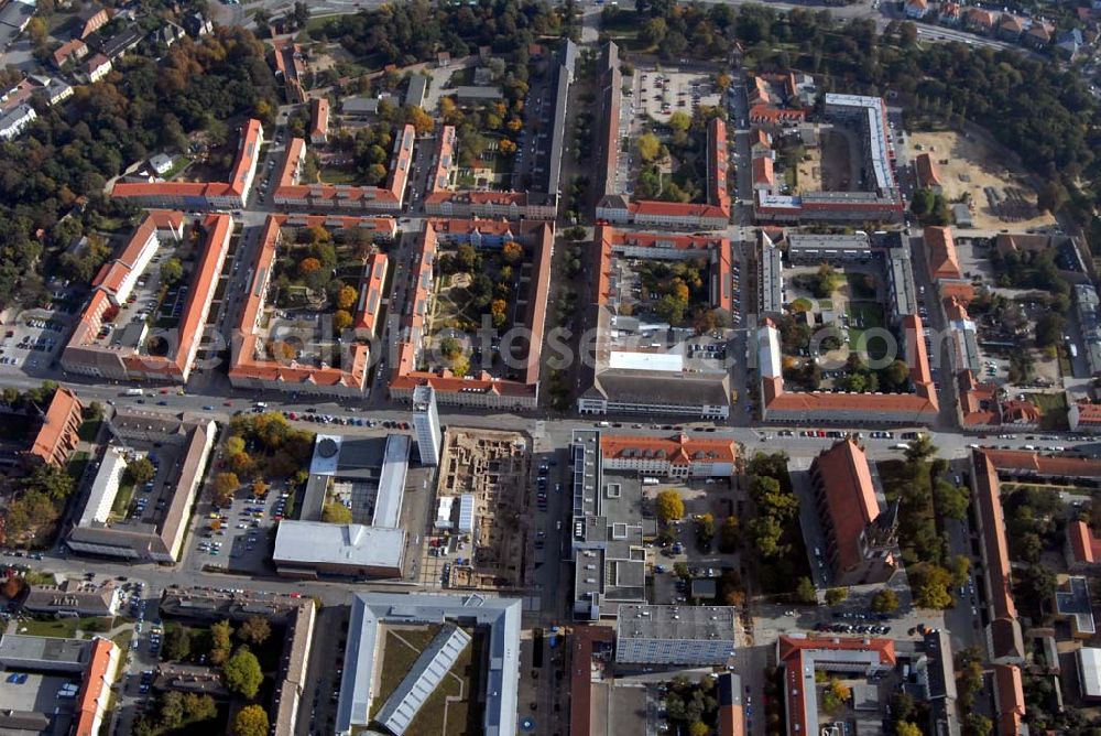 Neubrandenburg from the bird's eye view: Blick auf das Stadtzentrum von Neubrandenburg mit dem Marktplatz-Center der ECE GmbH Hamburg. Neben dem Center entsteht unter dem Marktplatz im Auftrag der Stadt eine Tiefgarage. Anschrift des Centers: ECE-CENTERMANAGEMENT, ECE Projektmanagement G.m.b.H. & Co. KG, Center-Management, Marktplatz-Center Neubrandenburg, Krämerstraße 1a, 17033 Neubrandenburg; Telefon: 03 95 / 570 610