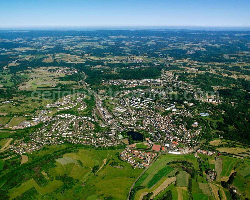 Baumholder from above - City view from the downtown area with the outskirts with adjacent agricultural fields in Baumholder in the state Rhineland-Palatinate, Germany