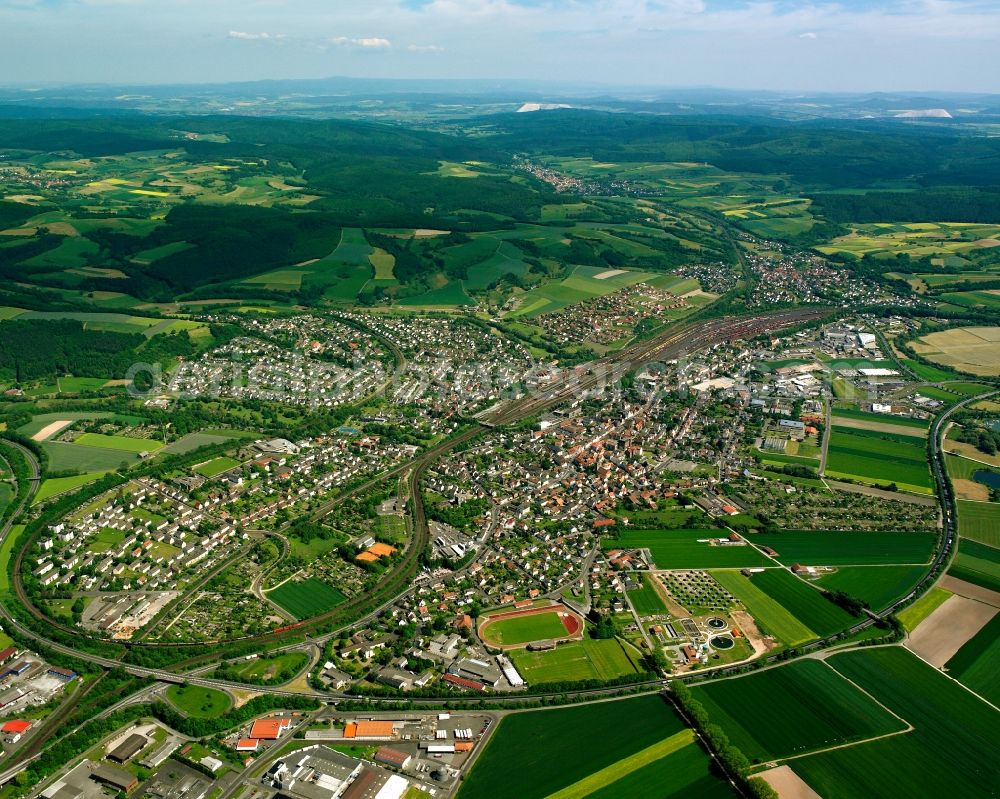 Bebra from the bird's eye view: City view from the downtown area with the outskirts with adjacent agricultural fields in Bebra in the state Hesse, Germany