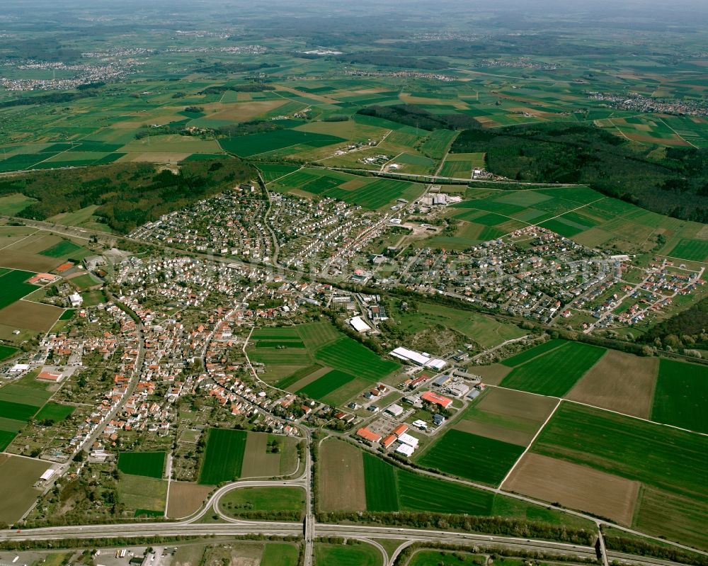 Aerial image Lang-Göns - City view from the downtown area with the outskirts with adjacent agricultural fields in Lang-Göns in the state Hesse, Germany