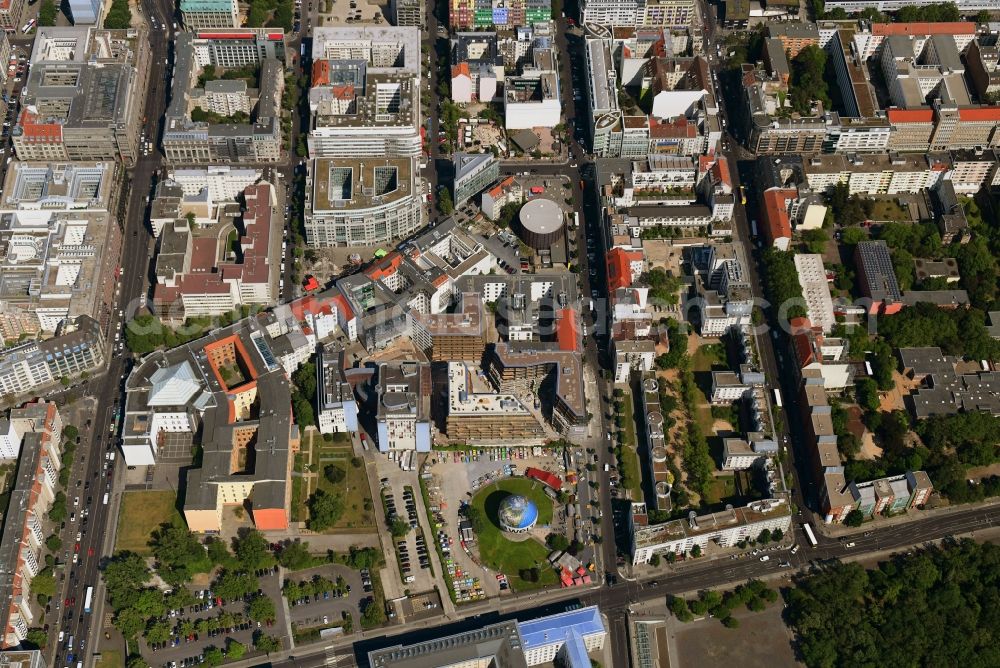 Berlin from the bird's eye view: Construction site to build a new multi-family residential complex Charlie Livin of Trockland Management GmbH along the Zimmerstrasse and Mauerstrasse in the district Mitte in Berlin, Germany