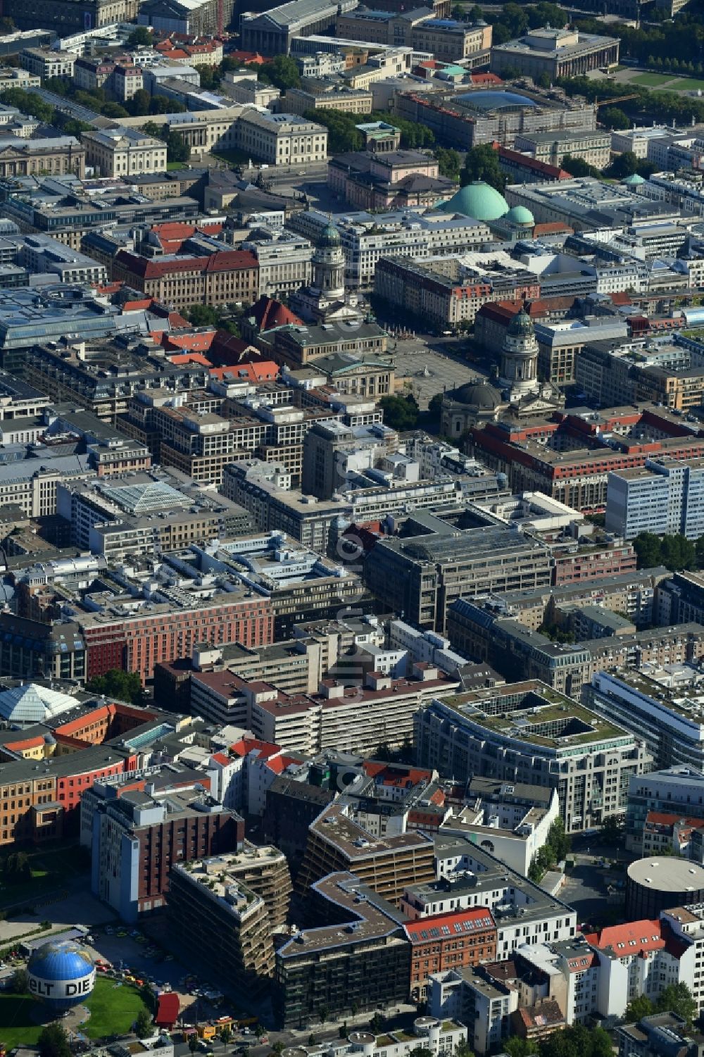 Berlin from the bird's eye view: Construction site to build a new multi-family residential complex Charlie Livin of Trockland Management GmbH along the Zimmerstrasse and Mauerstrasse in the district Mitte in Berlin, Germany