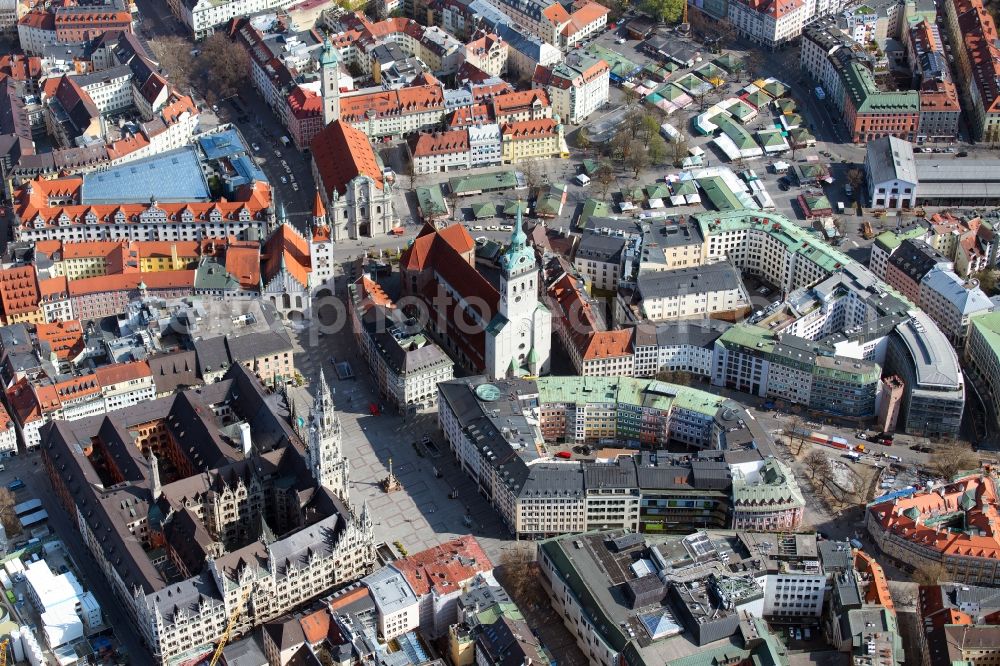 München from above - Old town area and inner city center with town hall, Marienplatz, Peterskirche and Viktualienmarkt in the old town in Munich in the state Bavaria, Germany