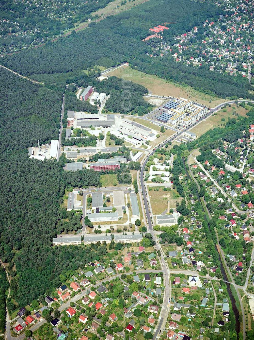 Aerial image Berlin-Köpenick - Blick auf das Gelände des Innovationspark Wuhlheide. Seit seiner Gründung im Jahr 1990 als erstes Technologie- und Gründerzentrum der neuen Bundesländer hat sich der IWP in Berlin zu einem wichtigen Gewerbe-Campus des Bezirks Treptow-Köpenick entwickelt. Innovationspark Wuhlheide Managementges.mbH Köpenicker Straße 325, 12255 Berlin