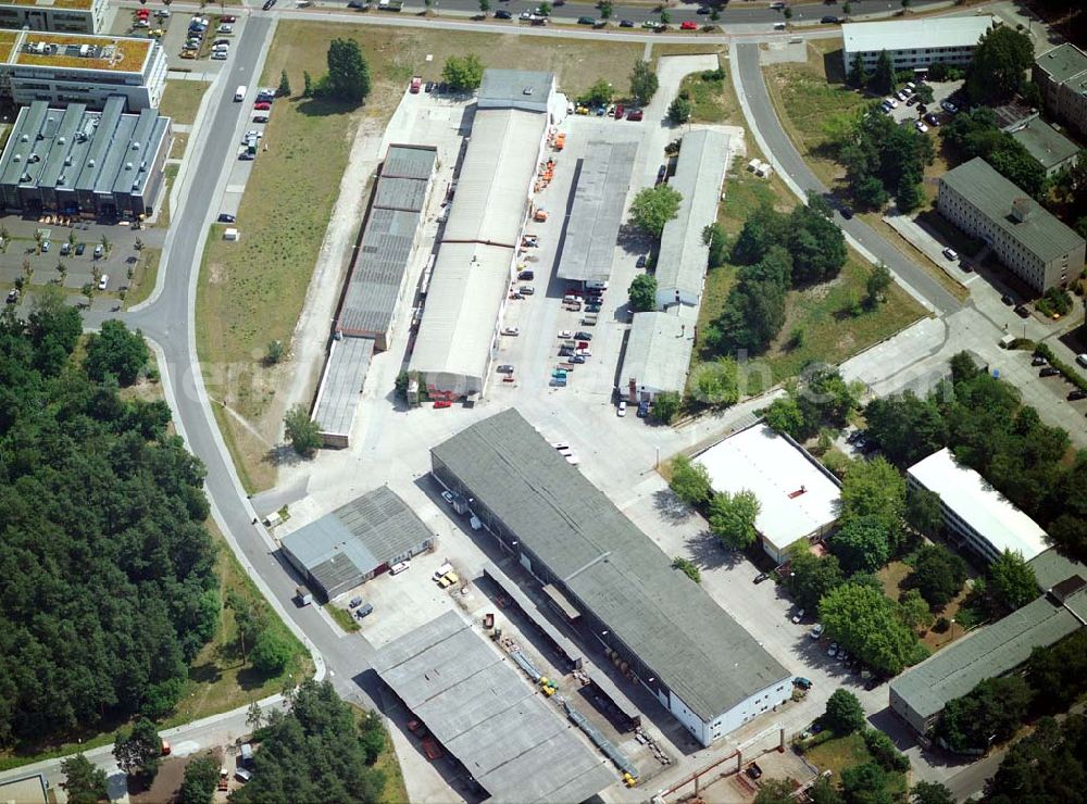 Aerial photograph Berlin-Köpenick - Blick auf das Gelände des Innovationspark Wuhlheide. Seit seiner Gründung im Jahr 1990 als erstes Technologie- und Gründerzentrum der neuen Bundesländer hat sich der IWP in Berlin zu einem wichtigen Gewerbe-Campus des Bezirks Treptow-Köpenick entwickelt. Innovationspark Wuhlheide Managementges.mbH Köpenicker Straße 325, 12255 Berlin