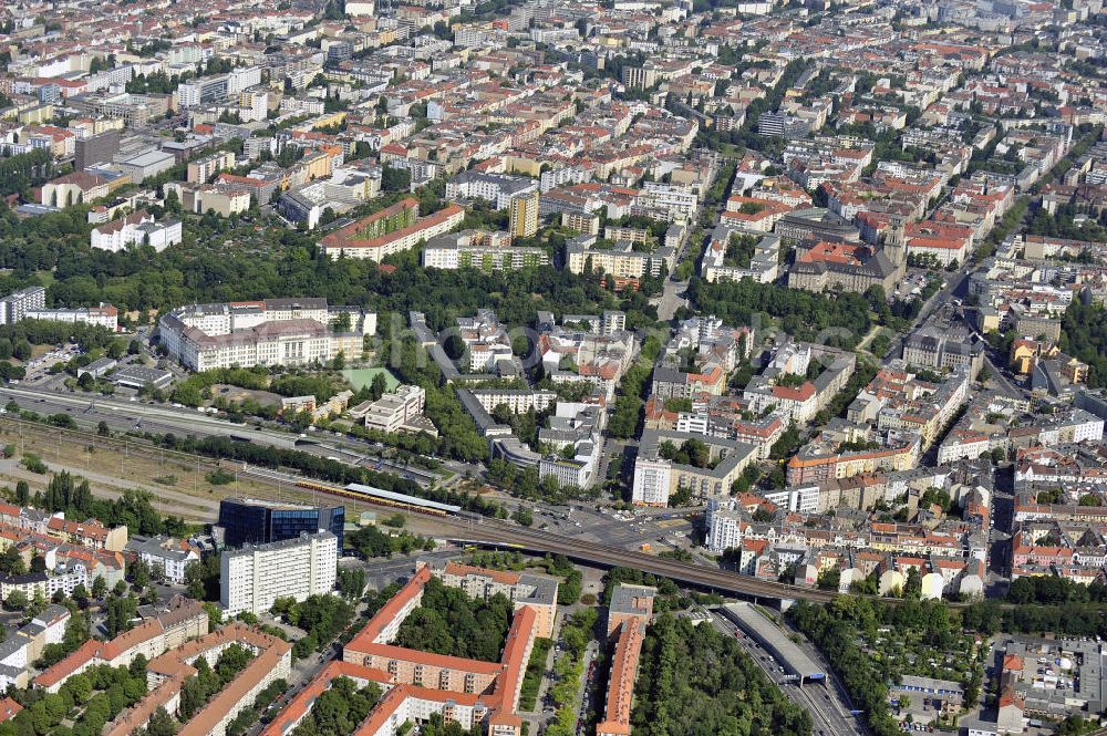 Aerial photograph Berlin - Blick auf den Innsbrucker Platz in Tempelhof-Schöneberg, Berlin. Erbaut 1910, bildet der Platz die Nahtstelle der Ortsteile Schöneberg und Friedenau. Am südlichen Rande des Platzes befindet sich die Ringbahnstation und U-Bahnstation Innsbrucker Platz. Auch die Stadtautobahn führt am Innsbrucker Platz vorbei, die Hauptfahrbahnen liegen im Tunnel komplett unter dem Platz. View at the Innsbrucker Platz in Tempelhof-Schöneberg, Berlin. Built in 1910, the place, the square is the interface of the districts of Schöneberg and Friedenau. At the southern edge of the square is the Ringbahn and subways station Innsbrucker Platz. The city highway passes the Innsbrucker Platz, the main roads are in the tunnel under the square completely.