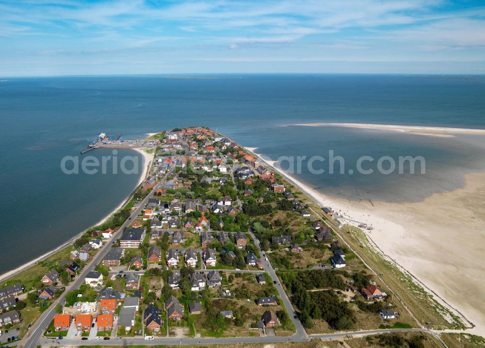 Aerial photograph Amrum - Blick auf die Insel Amrum, einer nordfriesischen Insel im Nationalpark Schleswig-Holsteinisches Wattenmeer in Nordfriesland in Schleswig-Holstein. Amrum ist die zehntgrößte Insel Deutschlands und gehört zu den drei nordfriesischen Geestkerninseln. Charakteristisch für die Insel ist der westlich angelagerten Kniepsand und dem kleinen westlich vorgelagerten Jungnamensand. Die fünf Orte der Insel liegen überwiegend im Osten der Insel – von Nord nach Süd – Norddorf auf Amrum, Nebel, Süddorf, Steenodde und Wittdün auf Amrum. Amrum, the third largest German island in North Friesland in Schleswig-Holstein.